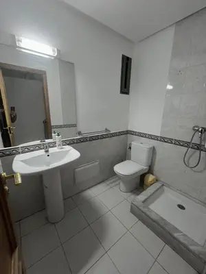 a bathroom with a sink and a toilet at Elegant apartment in the heart of Gueliz in Marrakech