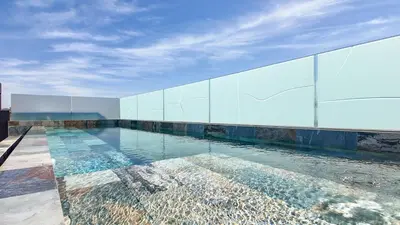 a swimming pool on the roof of a building at Duplex Cheryn Heated rooftop pool in Marrakech
