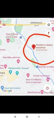 a map with a red line on it with a bird on it at maison Noé , chambre au rez de chaussée ,un lit double, sale de bain privative séparer in Marrakech