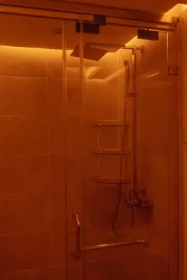 a bathroom with a shower with a shower at Appart Duplex 3ch Piscine in Marrakech
