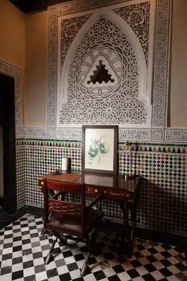 a room with a table and a picture on a wall at L Mansion Villa in Najem