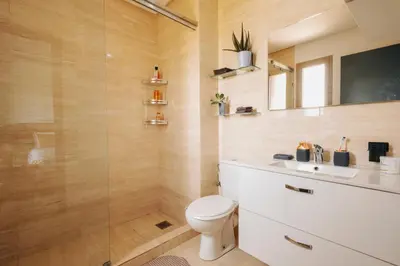 a bathroom with a toilet and a sink at Z-series Appartement unique et moderne in Marrakech