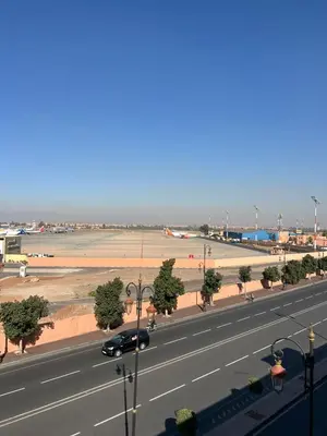 a view of a highway with cars driving down the road at Airport view apartment Marrakech in Marrakech