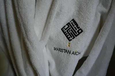 a close up of the back of a white shirt at Maristan Aicha Marrakech in Marrakech