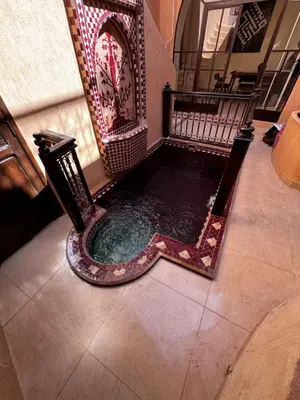 a pool of water in a room with at Maristan Aicha Marrakech in Marrakech
