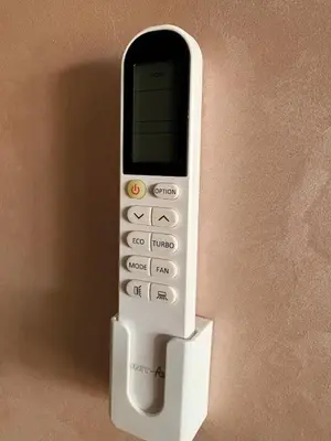 a cell phone is attached to a wall at Elegant apartment near the airport in Marrakech