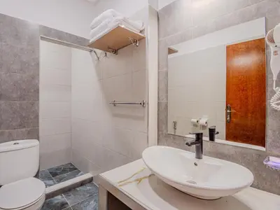 a bathroom with a sink and a toilet at 1Br & private garden perfect location in Marrakech in Marrakech