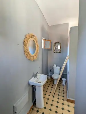 a bathroom with a sink and a toilet at Oasis Villa in Marrakech