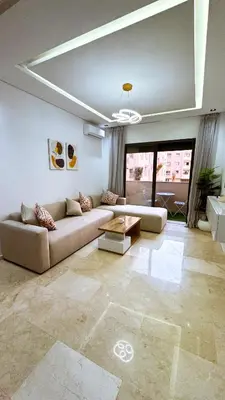 a living room with a couch and a table at Leila in Marrakech
