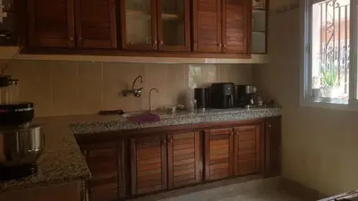a kitchen with a sink and a counter top at Home for peace & enjoyment in Marrakech