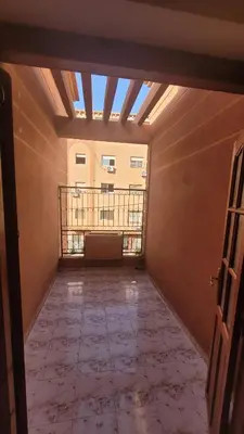 an empty room with a window and a balcony at Comfortable room, balcony in Marrakech