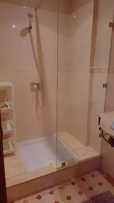 a shower with a glass door in a bathroom at Appartement Majorella Gueliz Centre Marrakech in Marrakech