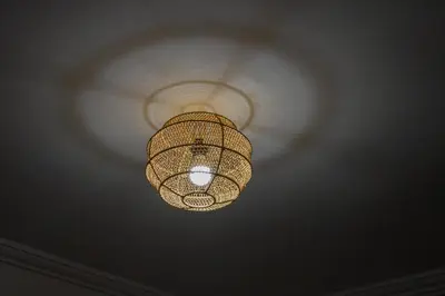 a chandelier hanging from a ceiling in a room at Heart of Marrakech - Hivernage 2 bedroom apartment in Marrakech