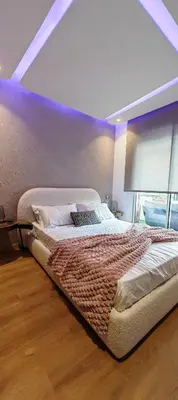 a bedroom with a large bed in a room at Whispers of NATURE in Marrakech