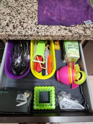 a drawer filled with lots of kitchen utensils at Comfortable apartment for families in Marrakech