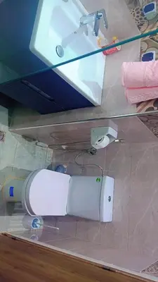 a sink and a roll of toilet paper in a drawer at Appartement,kech in Marrakech