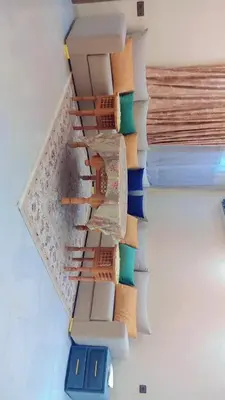 a staircase in a room with blue and white at Appartement,kech in Marrakech