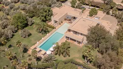 an aerial view of a house with a swimming pool at 2 Superbe villas avec chacune piscine privée & jardin 5 ou 6 chambres in Marrakech