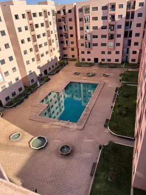 an overhead view of a swimming pool in a building at New! Nouveau! Le Cocon familial in Marrakech