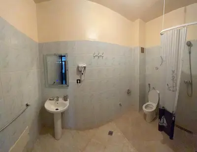 a bathroom with a sink and a toilet at Beautiful, very quiet apartment in Marrakech