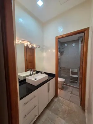 a bathroom with a sink and a toilet at Villa targa prestige in Marrakech