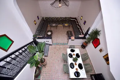 an overhead view of a living room with a floor at Le riad de Daba in Marrakech