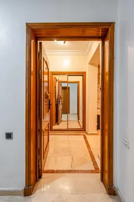 an open door to a hallway in a house at Marrakech Centre Ville Rooftop & Espace Fitness in Marrakech