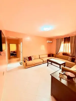 a living room with a couch and a table at N9 Parfait Top Près De Gueliz in Marrakech