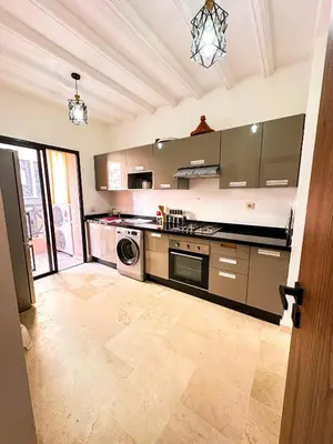 a kitchen with a stove and a dishwasher at Chez Mams Guest House - Private Rooms in a Resort-Style Apartment Complex in Marrakech