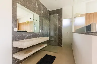 a bathroom with a sink and a mirror at Villa Seyana 1 Zero Vis a Vis et Piscine Chauffee in Marrakech