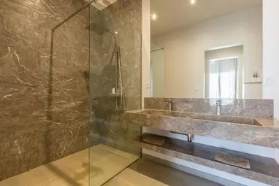 a bathroom with a sink and a shower at Villa Seyana 1 Zero Vis a Vis et Piscine Chauffee in Marrakech