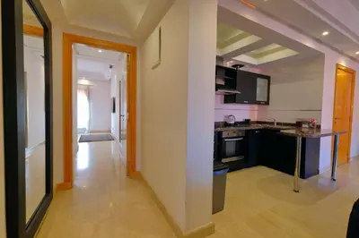 a kitchen with a sink and a counter at DannaMs Apartment MohamedV Hivernage in Marrakech