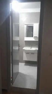 a bathroom with a white sink and a mirror at Bahiya in Marrakech