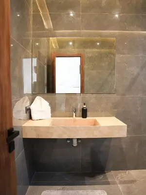 a bathroom with a sink and a mirror at Villa Crystale - Marrakech in Marrakech