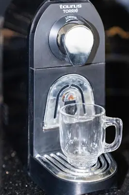 a coffee maker with a glass cup in it at Superbe Appart 3 pièces Moderne, Confort avec vue panoramique sur Marrakech plein centre à 7 min a pied de Gueliz in Marrakech
