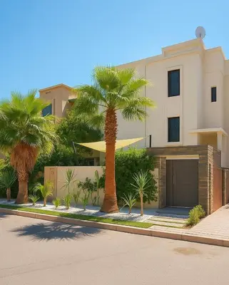a palm tree in front of a house with a garage at cozy villa 3 Rooms pool wifi -Only Family in Marrakech