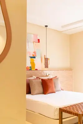 a bedroom with a white bed with pillows at fantastic Apartment in Marrakech