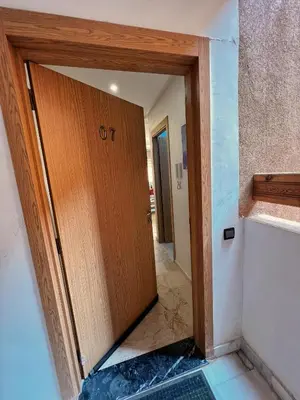 a door with the number on it in a room at Cozy & Elegant apartment Marrakech in Marrakech