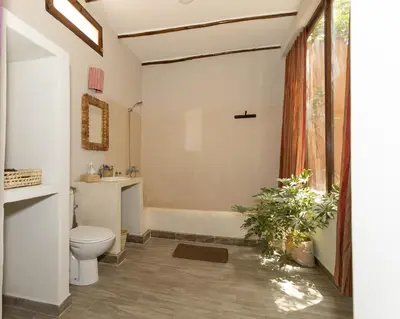 a bathroom with a toilet and a sink and a shower at Guesthouse Better Together in Marrakech