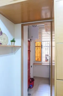 a room with a hallway with a door and a window at NS 51 by KMREI Properties in Marrakech