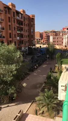a group of bikes parked in a parking lot at Luxurious apartment ,hot tub in Marrakech