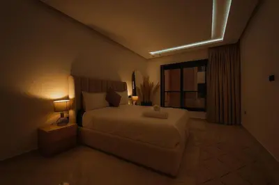 a bedroom with a large bed and a window at Stylish Hivernage Studio in Marrakech