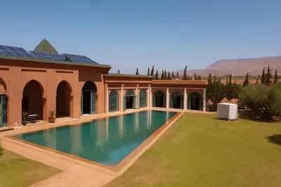 a swimming pool in the yard of a house at Villa de Charme avec Piscine, Hammam & Jardin Enchanté in Marrakech