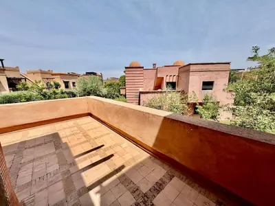 a view of a balcony of a building at Private Garden Villa - Rooftop, BBQ, Pools and Views in Marrakech