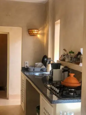 a kitchen with a stove and a counter top at PRIVATE HOUSE in Medina Close to Jeema El Fna in Marrakech