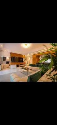 a large living room with couches and tables at Marrakech Luxury Golf Villa Private Heated Pool & Garden Oasis in Marrakech