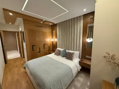 a bedroom with a large bed in a room at Luxury 2BDR AP in Central Marrakech Gueliz in Marrakech