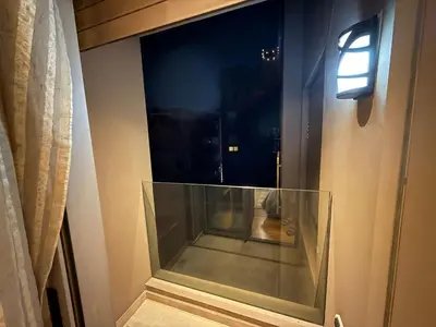 a window in a room with a view of a city at Luxury 2BDR AP in Central Marrakech Gueliz in Marrakech
