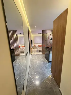 a room with a hallway with a mirror at Cosy Studio Cinema PS5 and home cinema 10 min Downtown in Marrakech