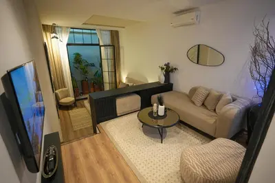 a living room with a couch and a table at studio à marrakech in Marrakech